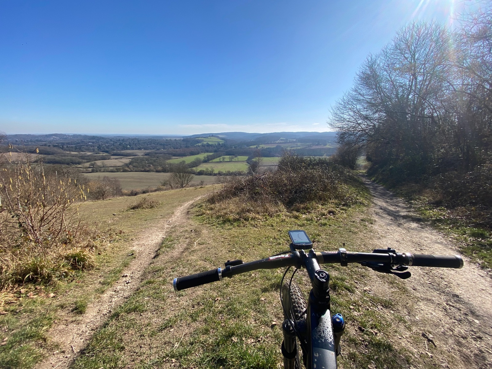 Trail descending across open hills near Westcott